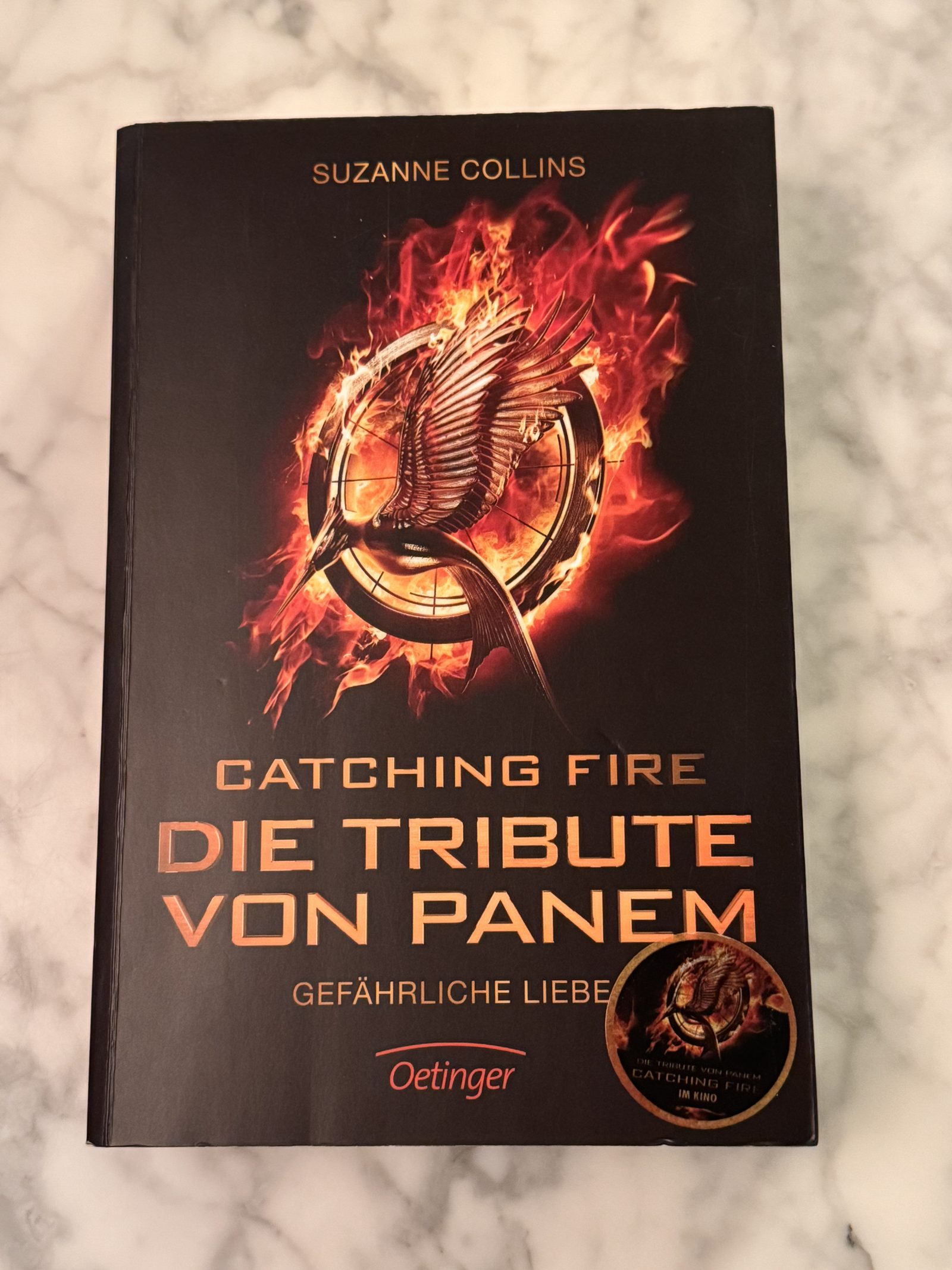 Livre  roché  "Die Tribute von Panem - Catching Fire" en allemand